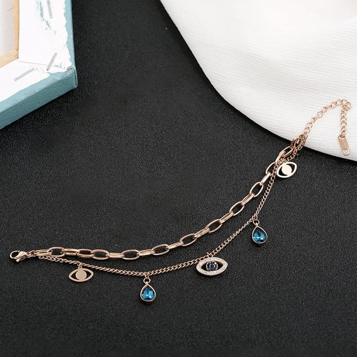 “Charm & Disarm” – Evil Eye Galaxy Bracelet