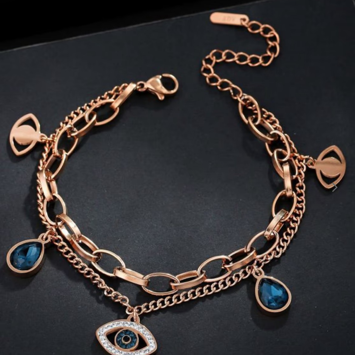 “Charm & Disarm” – Evil Eye Galaxy Bracelet