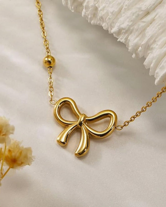 Golden Bow Pendant Necklace – Playful Elegance with a Feminine Twist