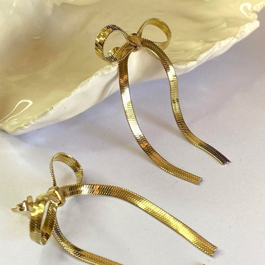 Gold Textured Ribbon Bow Drop Earrings – Chic & Feminine Statement