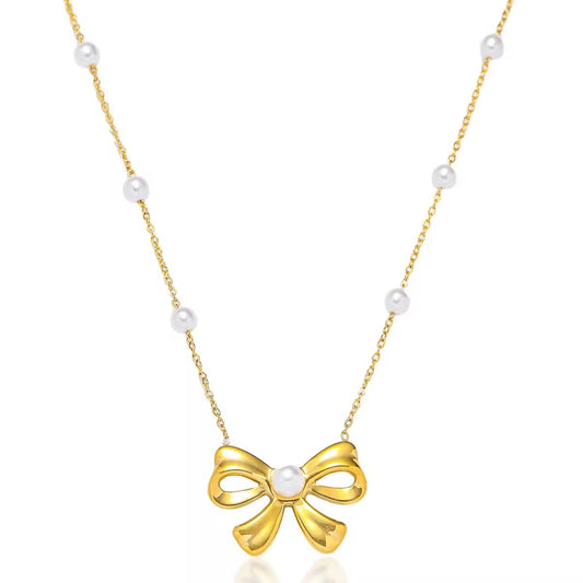 Gold Bow Necklace with Pearl Accents